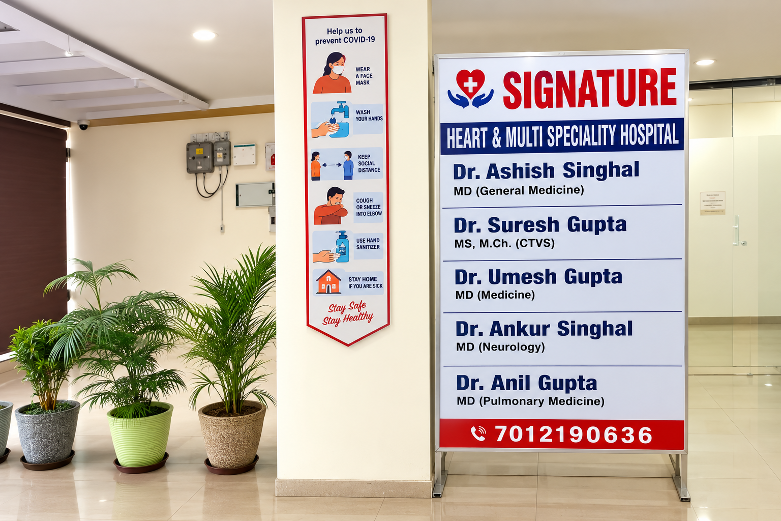 Reception lobby and doctor information display at Signature Hospital